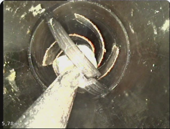 Rimozione meccanica della guarnizione sotto controllo video